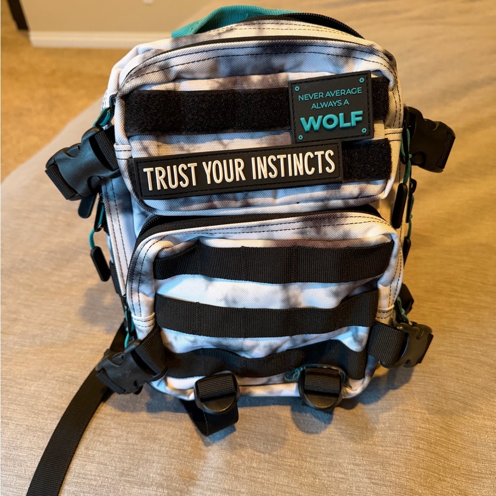 9L Wolfpak backpack Mini Timber Wolf Aqua Goddess